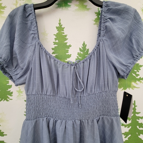 New Juniors City Triangle Short Sleeve Romper. - Picture 3 of 9